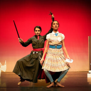 two women dancing on the stage